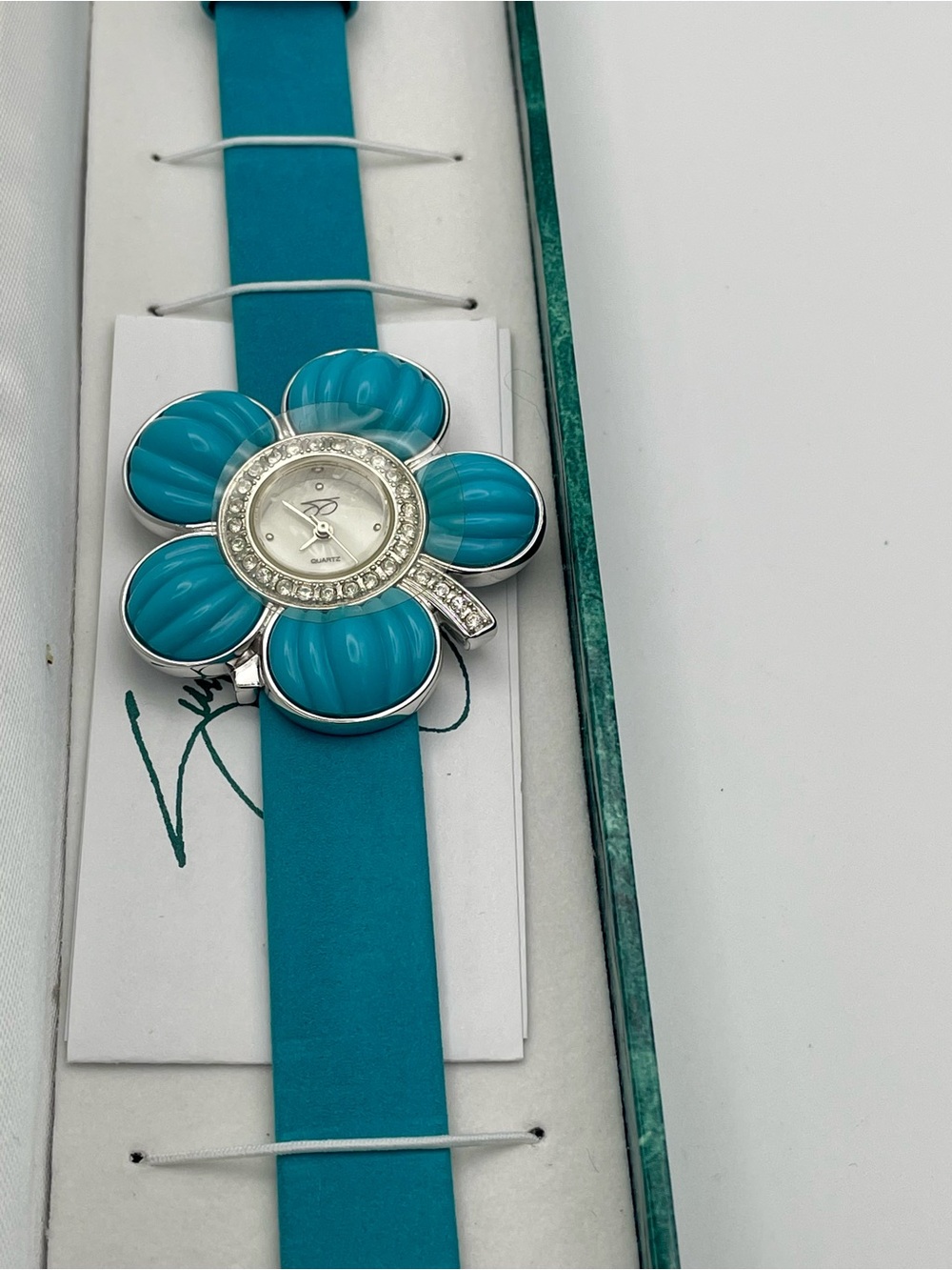 Suzanne Somers Turquoise Flower Watch with Rhinestone Bezel. Blue Leather Band